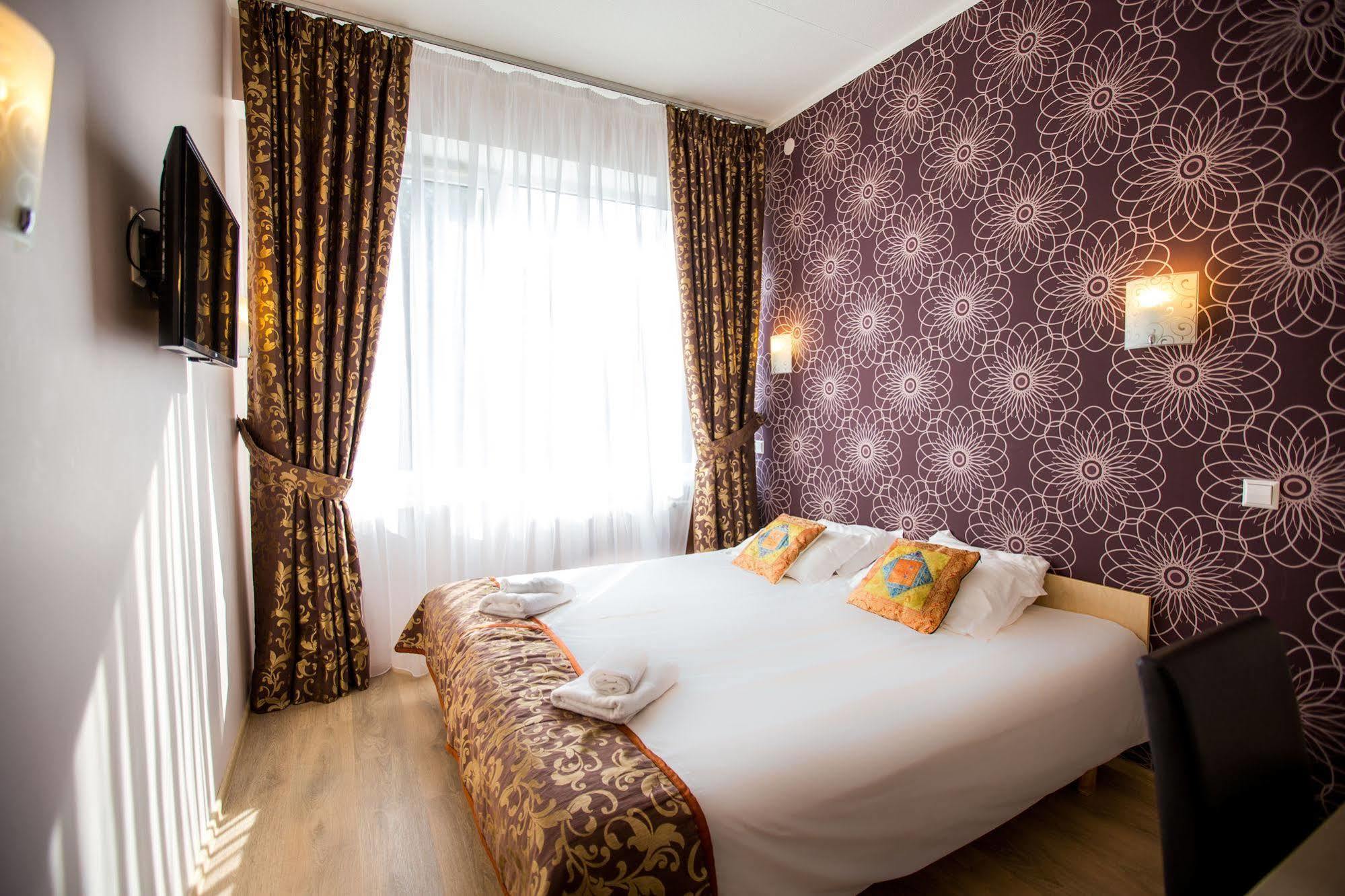 Citystop Hotel Тарту Экстерьер фото